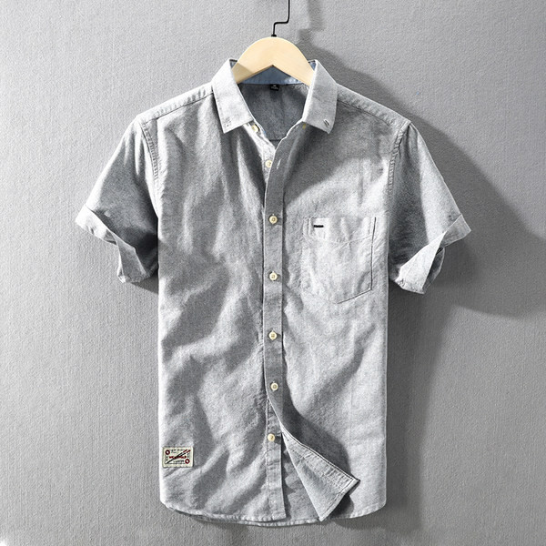 Памучна едноцветна риза с къс ръкав и копчета