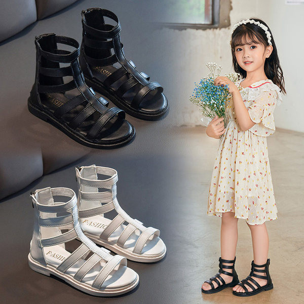 Bērnu sandales ar plakanām zolēm un ādas lencēm