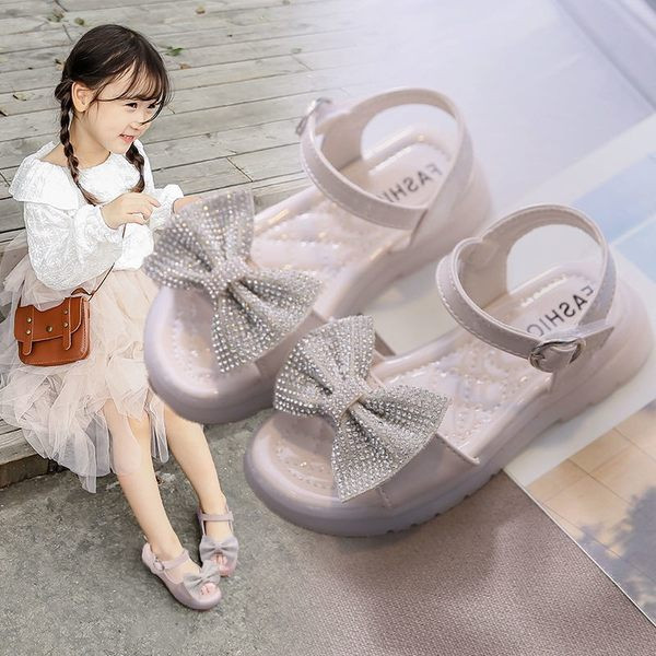 Modernas sandales ar lentīti un akmentiņiem trīs krāsās