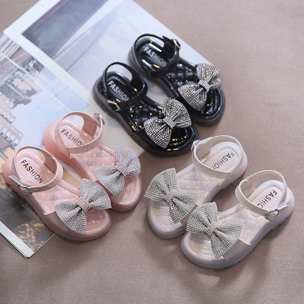 Modernas sandales ar lentīti un akmentiņiem trīs krāsās