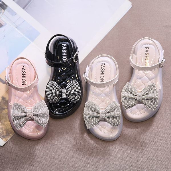 Modernas sandales ar lentīti un akmentiņiem trīs krāsās