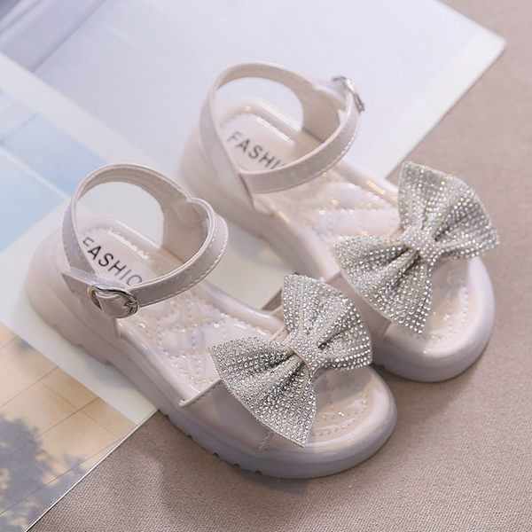 Modernas sandales ar lentīti un akmentiņiem trīs krāsās