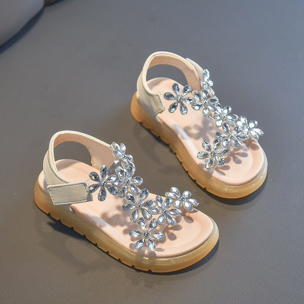 Bērnu sandales, kas dekorētas ar akmeņiem un uzlīmēm