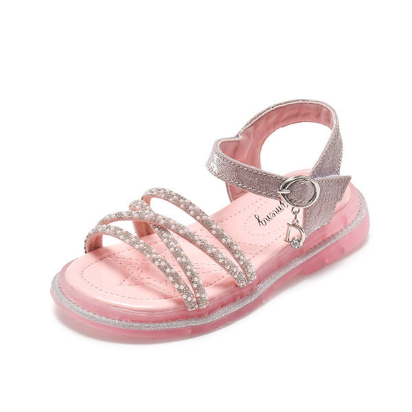 Bērnu sandales ar krusteniskām siksnām un dekorācijas akmeņiem