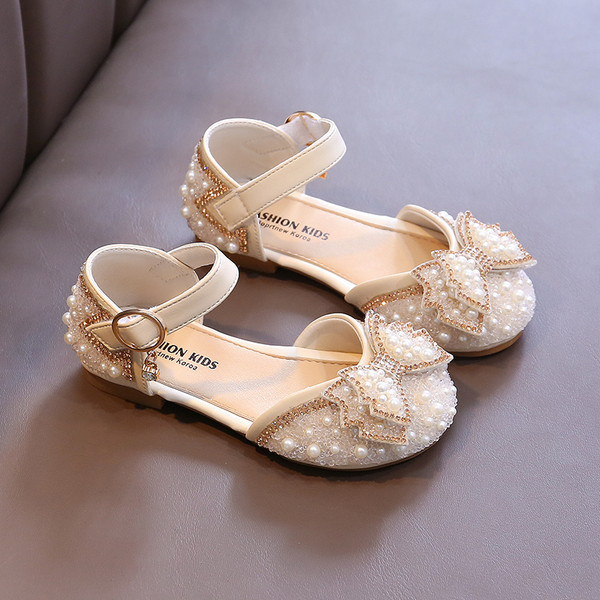 Актуални детски сандали с перли и панделка в два цвята
