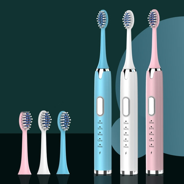 Elektriskā zobu birste ar mīkstiem sariem un papildu uzgali