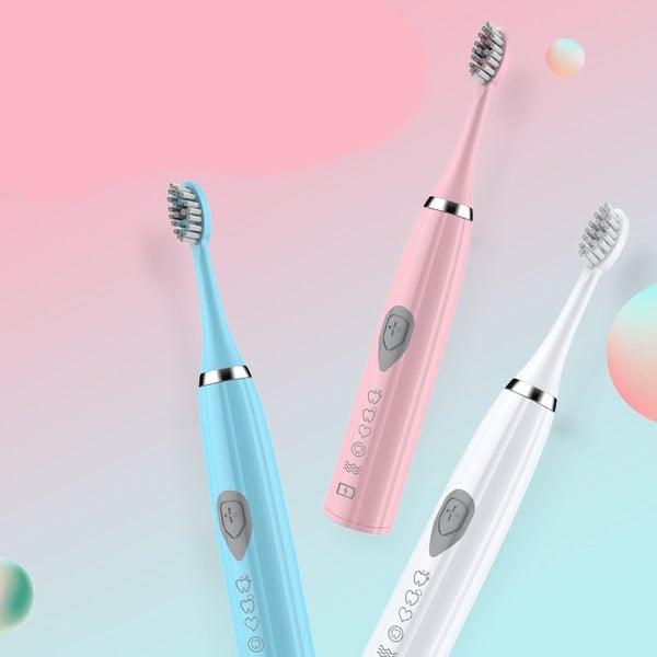 Electric toothbrush with additional tip in three colors