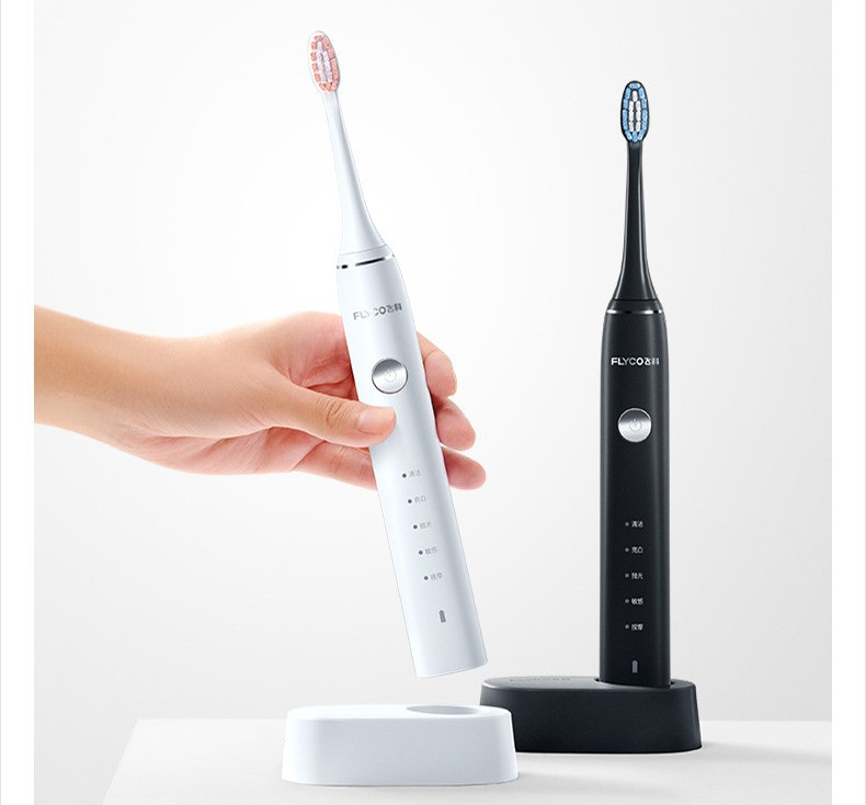 Elektriskā zobu birste baltā un melnā krāsā
