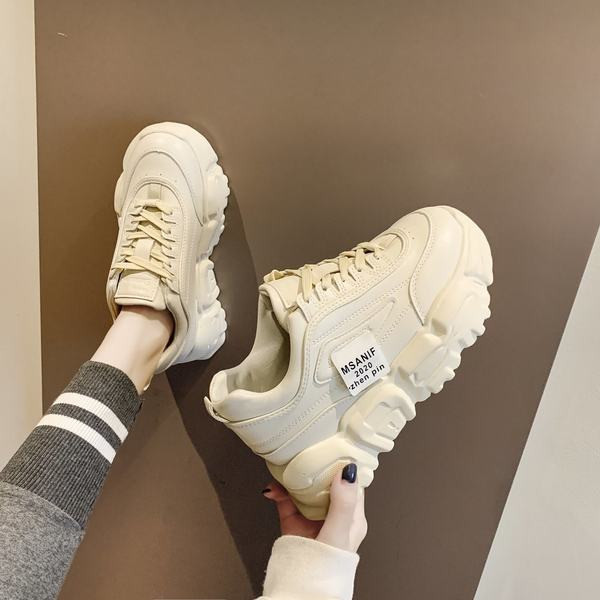 Sieviešu apavi ar šņorēm un augstām zolēm divās krāsās