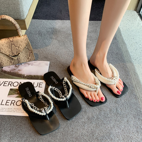 Sieviešu čības starp pirkstiem ar pērlēm