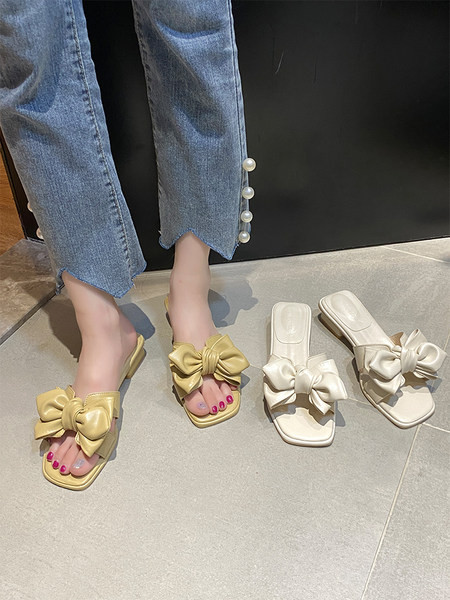 Sieviešu ādas čības ar lentes rotājumu