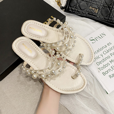 Γυναικείες παντόφλες με επίπεδη σόλα και διακόσμηση από πέρλες