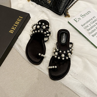 Γυναικείες παντόφλες με επίπεδη σόλα και διακόσμηση από πέρλες