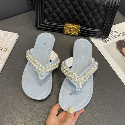 Sieviešu čības starp pirkstiem ar pērļu rotājumu