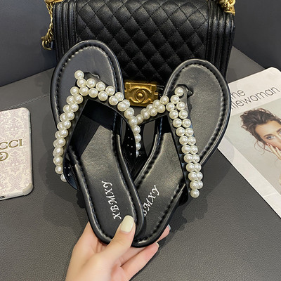 Sieviešu čības starp pirkstiem ar pērļu rotājumu