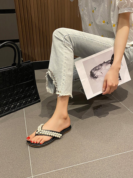 Sieviešu čības starp pirkstiem ar pērļu rotājumu