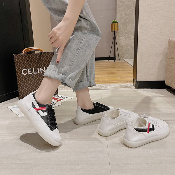 Sieviešu ikdienas kedas ar plakanām zolēm un šņorēm - divu krāsu