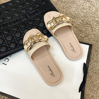 Γυναικείες επίπεδες παντόφλες με μεταλλική αλυσίδα