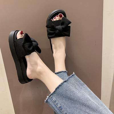 Γυναικείες τοπικές παντόφλες με κορδέλα και επίπεδη σόλα