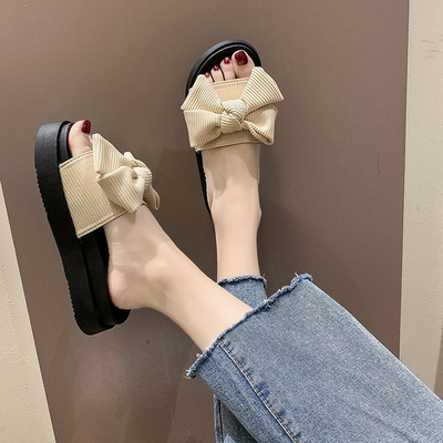 Γυναικείες τοπικές παντόφλες με κορδέλα και επίπεδη σόλα