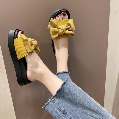 Γυναικείες τοπικές παντόφλες με κορδέλα και επίπεδη σόλα