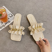 Ikdienas sieviešu čības ar ķēdīti un plakanu zoli