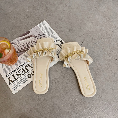 Ikdienas sieviešu čības ar ķēdīti un plakanu zoli