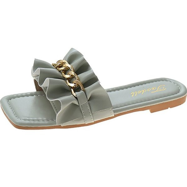 Ikdienas sieviešu čības ar ķēdīti un plakanu zoli