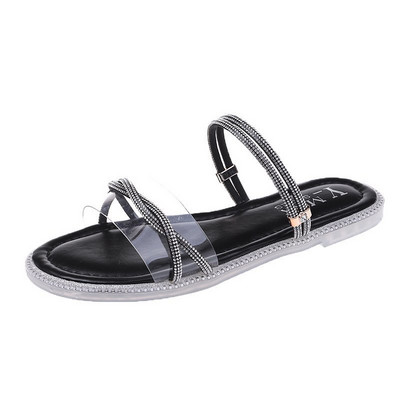 Jauns sieviešu čību modelis ar akmeņiem un plakanu zoli