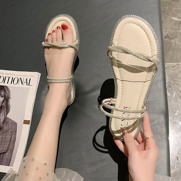 Jauns sieviešu čību modelis ar akmeņiem un plakanu zoli