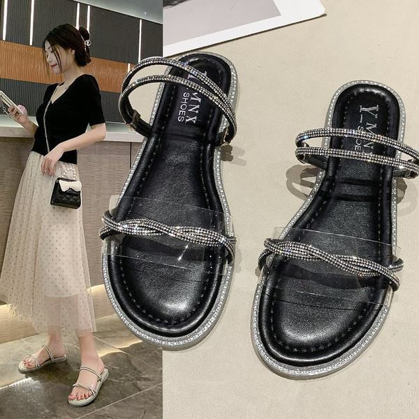 Jauns sieviešu čību modelis ar akmeņiem un plakanu zoli