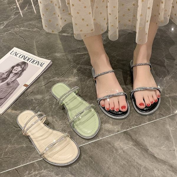 Jauns sieviešu čību modelis ar akmeņiem un plakanu zoli