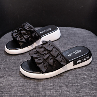 Ikdienas sieviešu čības ar plakanām zolēm un cirtām