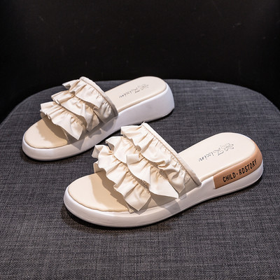 Ikdienas sieviešu čības ar plakanām zolēm un cirtām