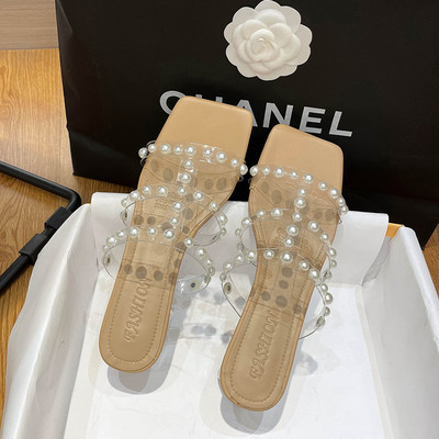 Jauns sieviešu čību modelis ar pērlēm un caurspīdīgu papēdi