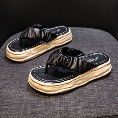 Ikdienas sieviešu čības ar plakanu zoli - starp pirkstiem