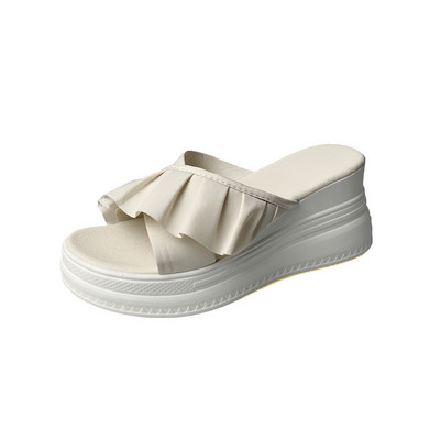 Γυναικείες παντόφλες με επίπεδη σόλα και βολάν