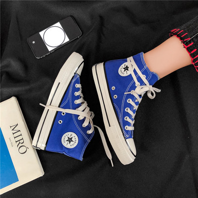 Καθημερινά αθλητικά παπούτσια με υφάσματα με έμβλημα