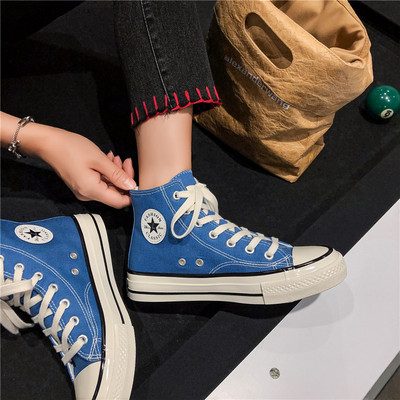 Καθημερινά αθλητικά παπούτσια με υφάσματα με έμβλημα