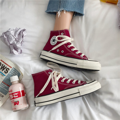 Καθημερινά αθλητικά παπούτσια με υφάσματα με έμβλημα