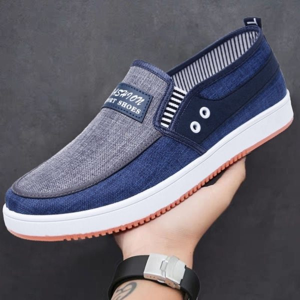 Men`s denim moccasins with an inscription and a flat sole