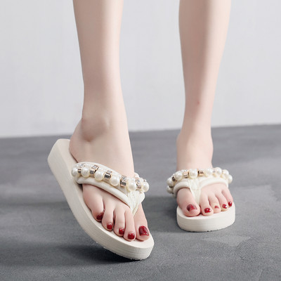 Jauns sieviešu flipu modelis ar dekoratīvām pērlēm un akmeņiem