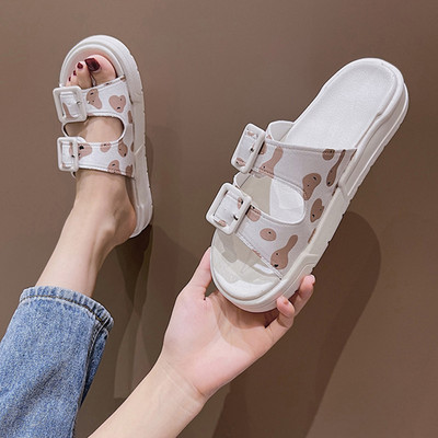 Jauns sieviešu čību modelis ar sprādzēm un plakanu zoli