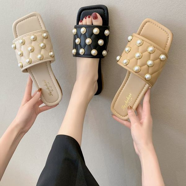 Aktuālās sieviešu čības ar plakanām zolēm un dekoratīvām pērlēm