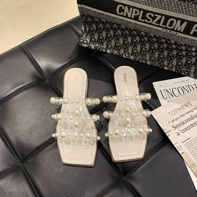 Stilīgas sieviešu čības ar plakanām zolēm un dekoratīvām pērlēm