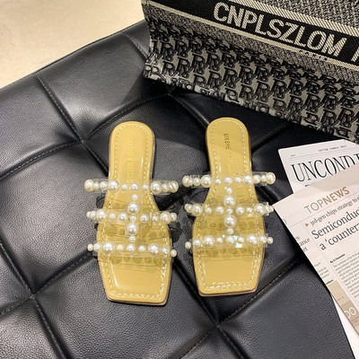 Stilīgas sieviešu čības ar plakanām zolēm un dekoratīvām pērlēm