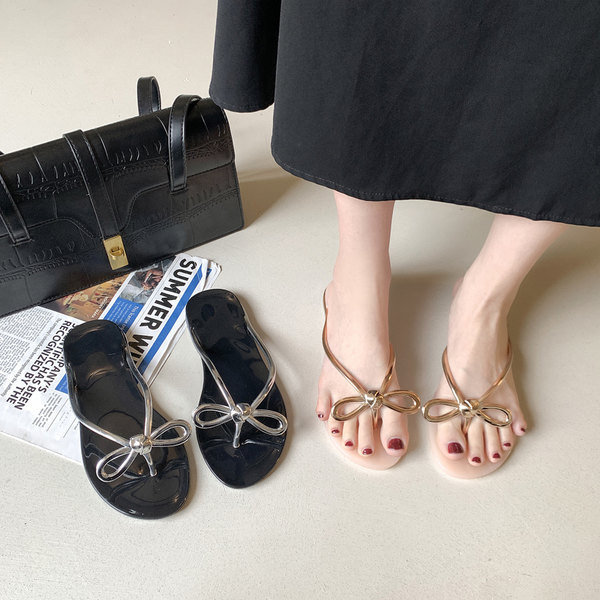 Ženske ležerne papuče između prstiju s trakom