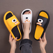 Gumijas čības ar suņu aplikāciju