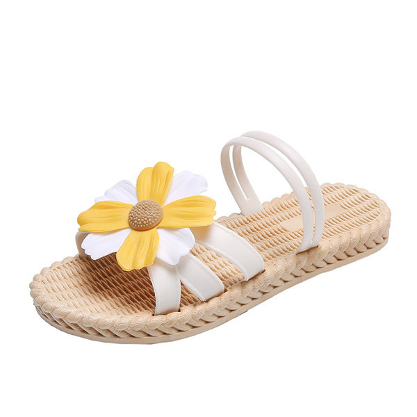 Sieviešu čības ar ziedu aplikāciju un plakanu zoli