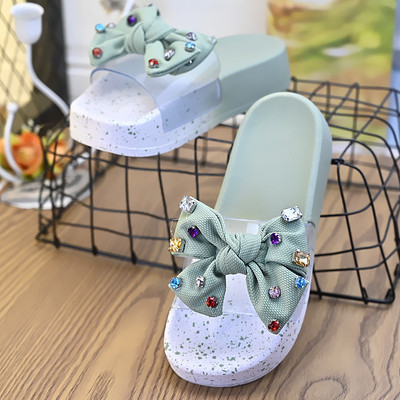 Jauns sieviešu čību modelis ar lentīti un akmentiņiem